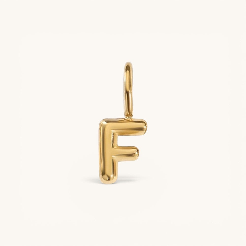 Nadare Co. gold-plated stainless steel bubble letter F charm with a rounded, puffed design for necklace layering.