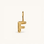 Nadare Co. gold-plated stainless steel bubble letter F charm with a rounded, puffed design for necklace layering.