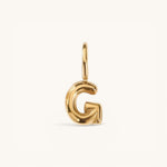 Nadare Co. gold-plated stainless steel bubble initial G charm with a rounded, playful puffed design.