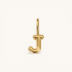 Nadare Co. gold-plated stainless steel bubble letter J charm with a rounded, puffed design for necklace layering.