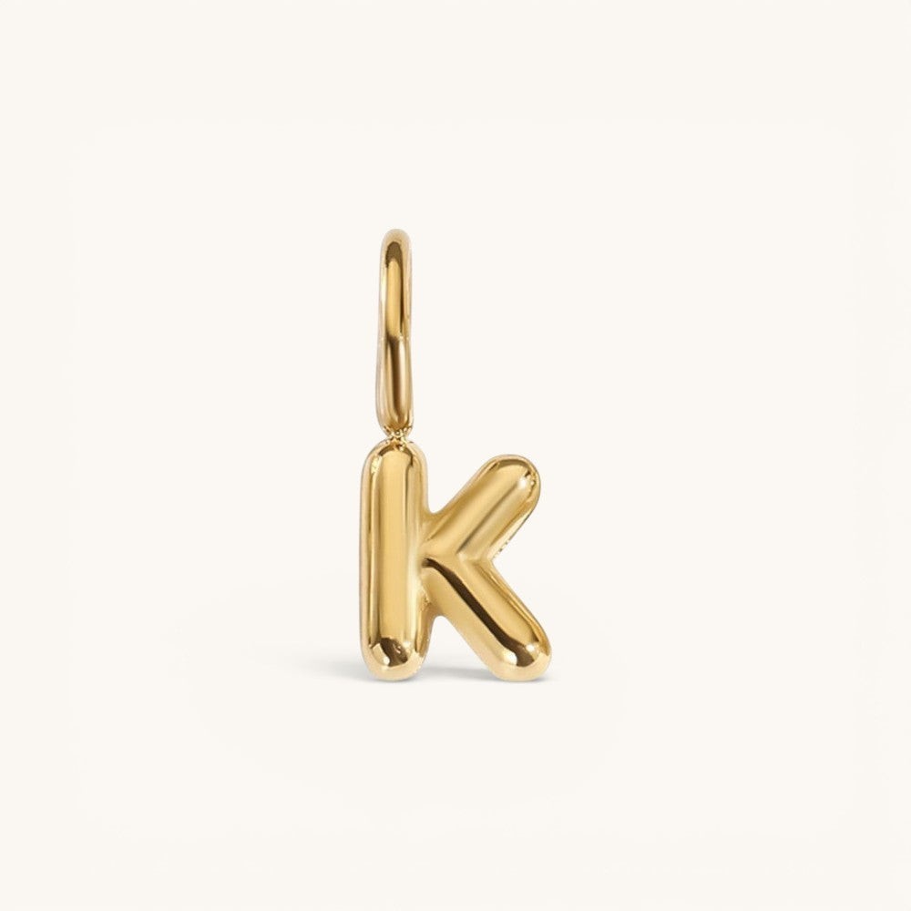 Nadare Co. gold-plated stainless steel bubble letter K charm with a rounded, puffed design for necklace layering.