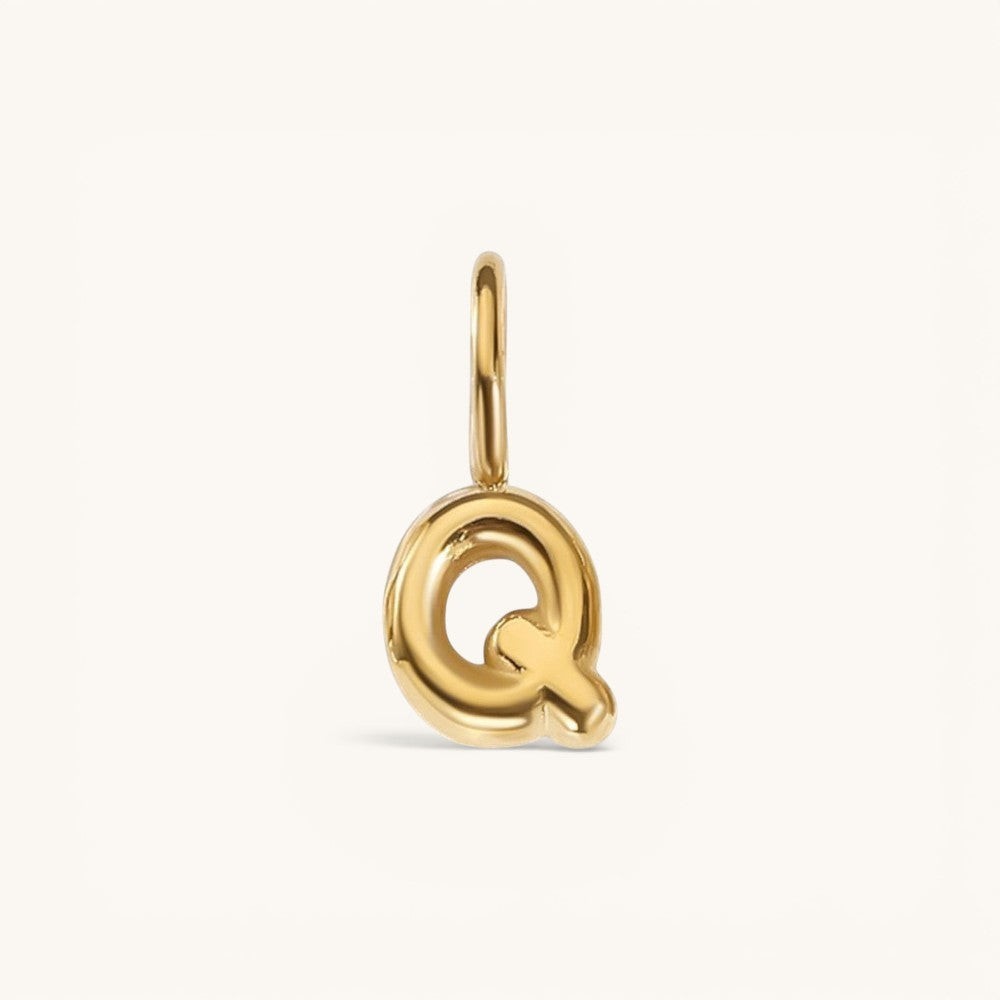 Nadare Co. gold-plated stainless steel bubble letter Q charm with a rounded, puffed design for necklace layering.