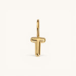 Nadare Co. gold-plated stainless steel bubble initial charm in the shape of the letter T with a rounded, puffed design.