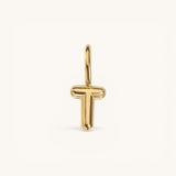 Nadare Co. gold-plated stainless steel bubble initial charm in the shape of the letter T with a rounded, puffed design.