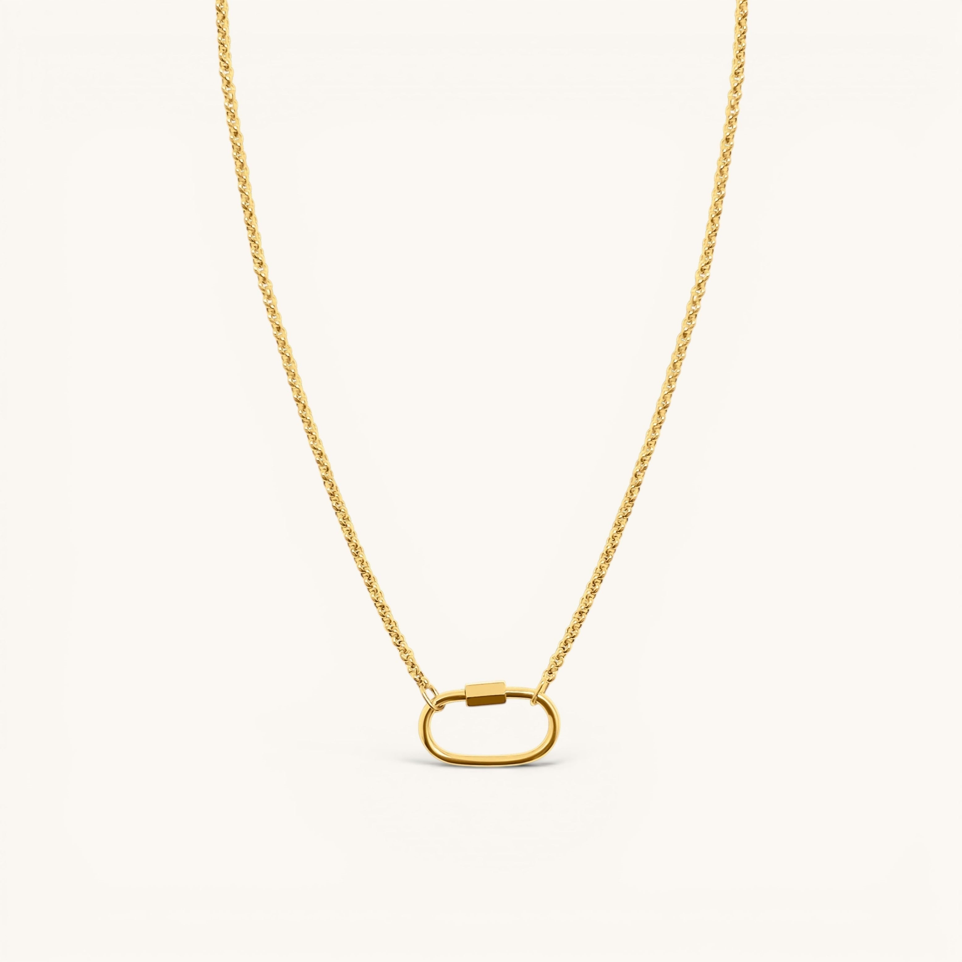 Nadare Co. gold plated stainless steel Classic Switch Chain necklace with a dainty oval carabiner pendant.