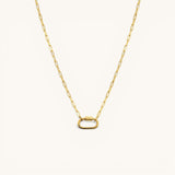 Nadare Co. gold carabiner charm necklace with a modern oval clasp on a delicate paperclip chain