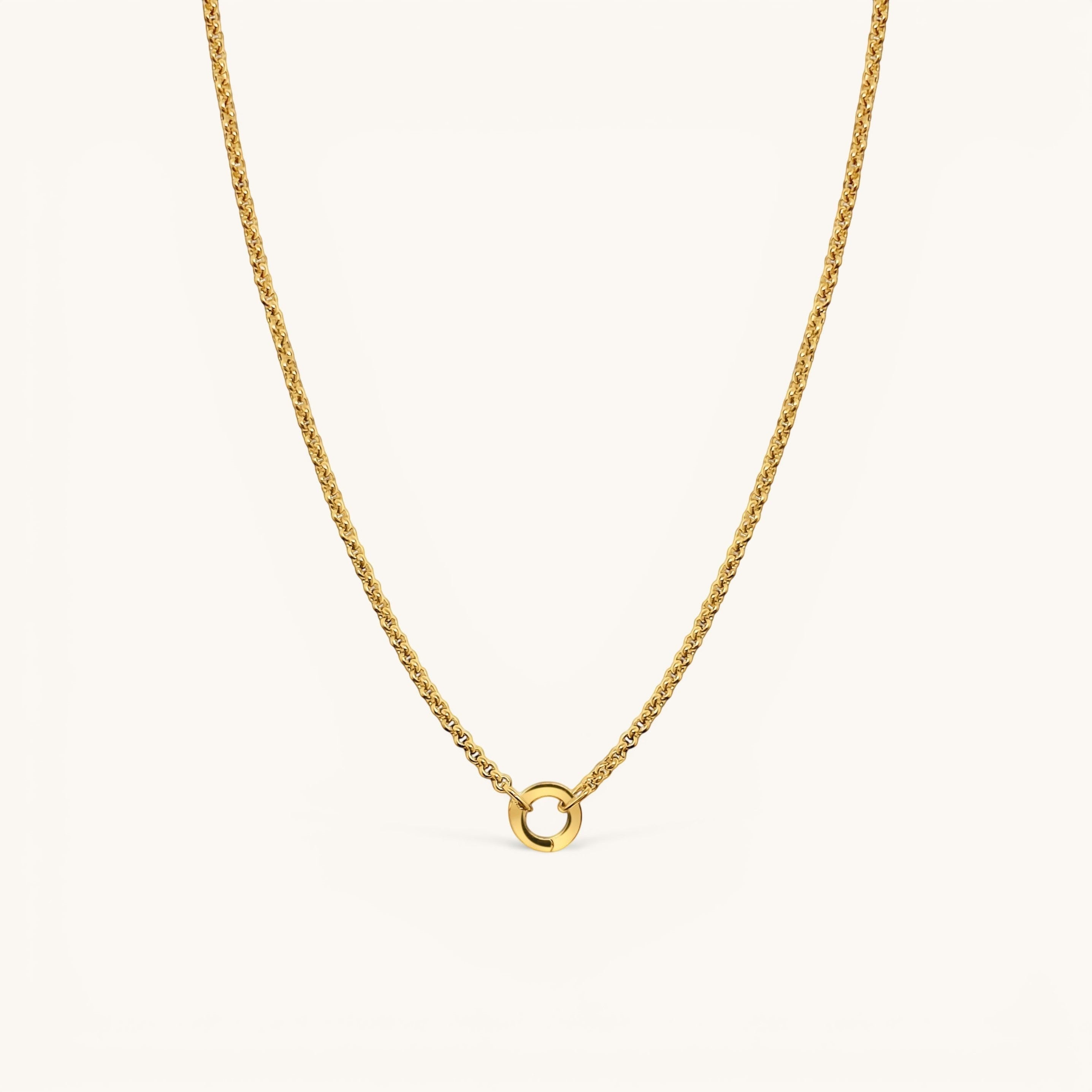 Nadare Co. gold plated chain necklace with a circular pendant link, designed for everyday wear.