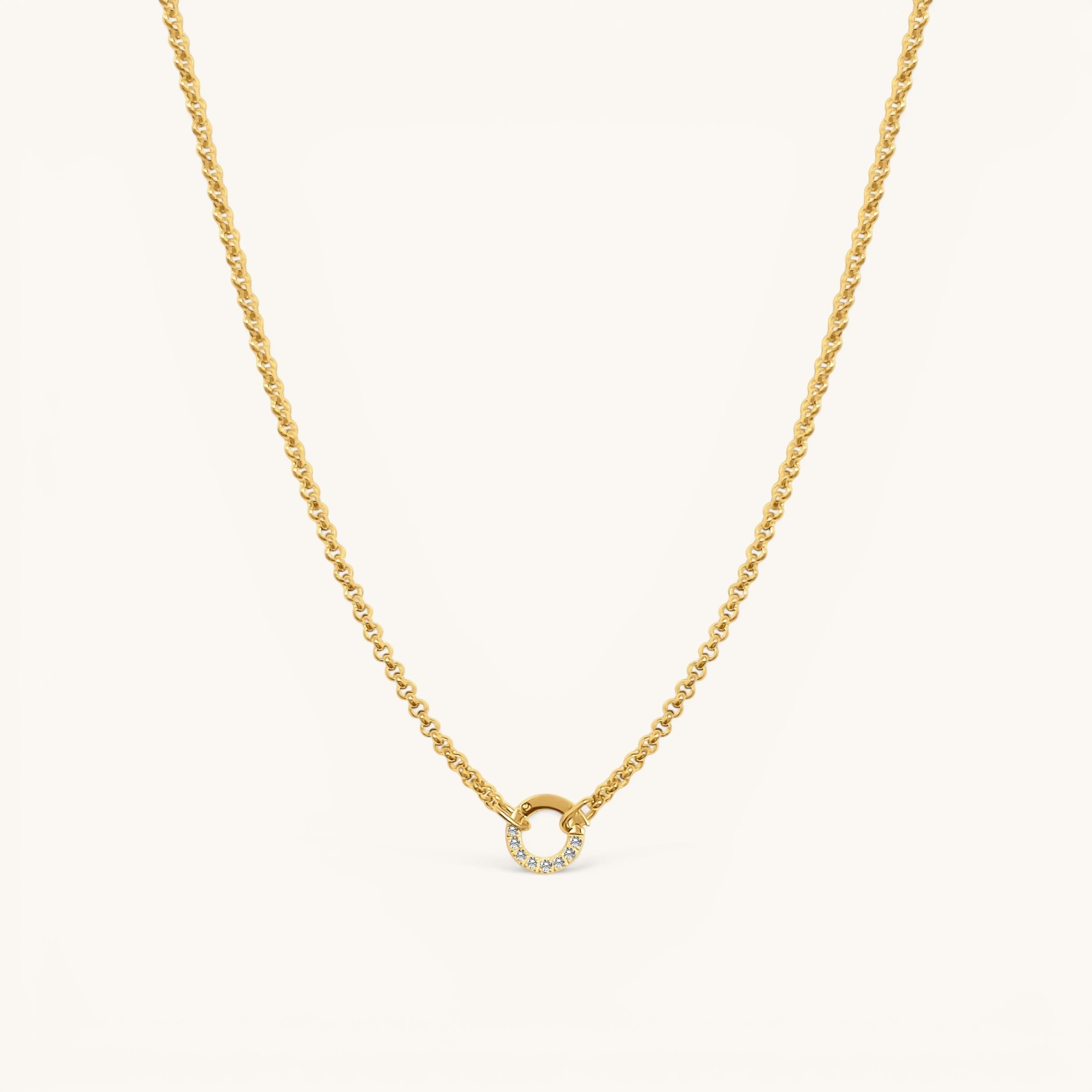 Nadare Co. gold plated chain necklace featuring a delicate circular pendant with embedded crystal birthstones.