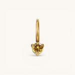 Nadare Co. mini gold hoop charm featuring a round yellow citrine birthstone in a delicate three-prong setting.