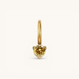 Nadare Co. mini gold hoop charm featuring a round yellow citrine birthstone in a delicate three-prong setting.