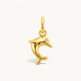 Nadare Co. gold-plated stainless steel dolphin charm with a sparkling cubic zirconia eye in a leaping silhouette.