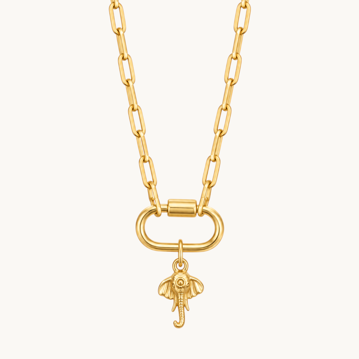 Nadare Co. gold-plated stainless steel elephant charm necklace with a detailed upturned trunk on a link chain.
