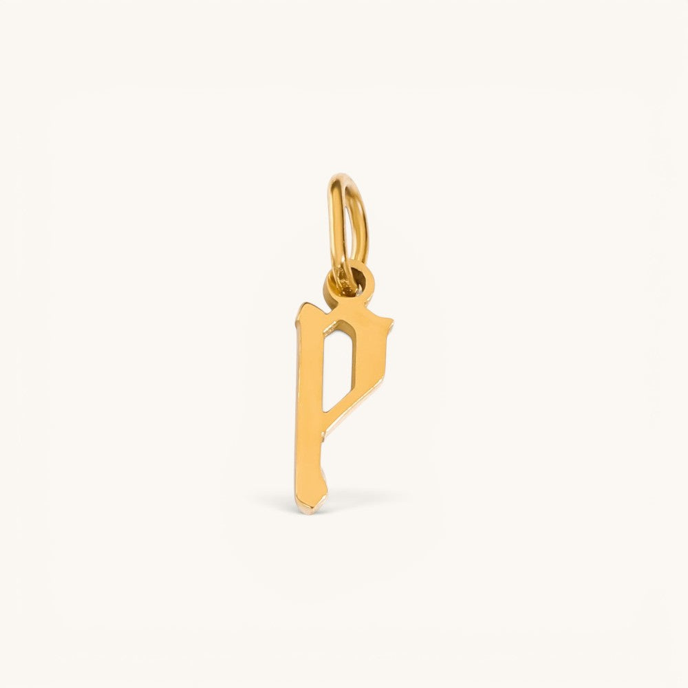 Nadare Co. gold-plated stainless steel gothic initial letter P charm with sharp edges for necklace stacking.