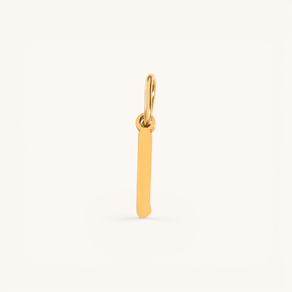 Nadare Co. gothic letter I charm in 14k gold plated stainless steel with a sharp, old-English inspired design.