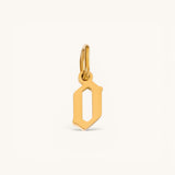 Nadare Co. gold-plated stainless steel gothic letter O charm with sharp edges and a polished finish.
