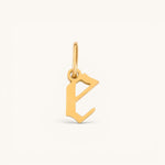 Nadare Co. gold-plated stainless steel gothic letter E charm with sharp edges for necklace stacking.