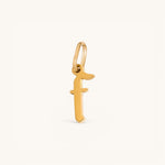 Nadare Co. gold-plated stainless steel gothic letter F charm with sharp edges for a necklace stack.