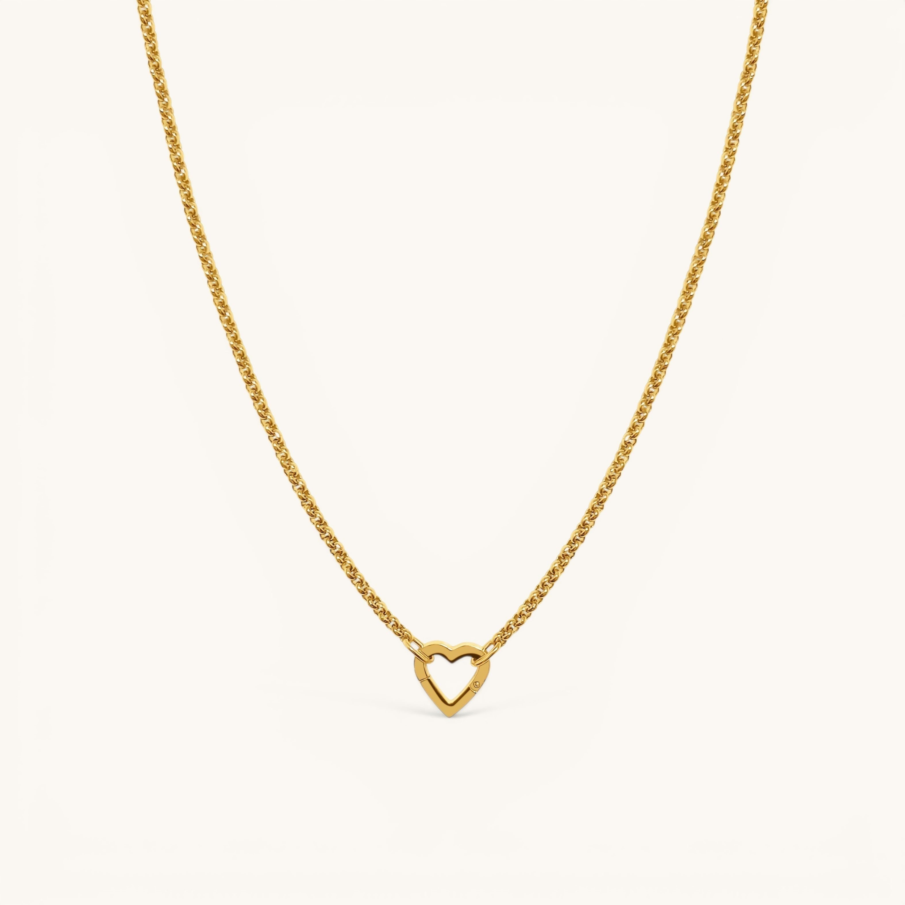 Nadare Co. gold plated stainless steel heart pendant necklace on a delicate chain, waterproof and tarnish-resistant.