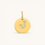 Nadare Co. gold initial charm with pavé set cubic zirconia on a polished disc.