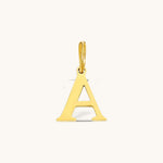 Nadare Co. gold-plated stainless steel initial charm featuring a classic serif letter A for necklace layering.