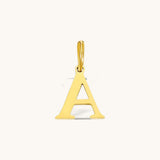 Nadare Co. gold-plated stainless steel initial charm featuring a classic serif letter A for necklace layering.