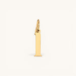 Nadare Co. lower case letter I charm in 14k gold plated stainless steel for everyday jewelry layering
