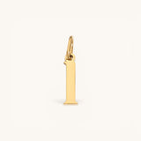 Nadare Co. lower case letter I charm in 14k gold plated stainless steel for everyday jewelry layering