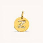 Nadare Co. gold initial Z charm with pavé set cubic zirconia on a polished disc.