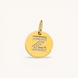 Nadare Co. gold initial Z charm with pavé set cubic zirconia on a polished disc.