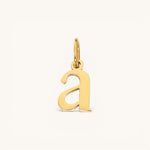 Nadare Co. lower case letter a charm in 14k gold-plated stainless steel with a polished finish.