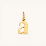 Nadare Co. lower case letter a charm in 14k gold-plated stainless steel with a polished finish.