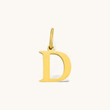 Nadare Co. gold plated stainless steel letter D charm with a classic serif font for everyday jewelry layering.