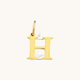 Nadare Co. gold-plated stainless steel letter H charm with a clean serif font for everyday jewelry layering.