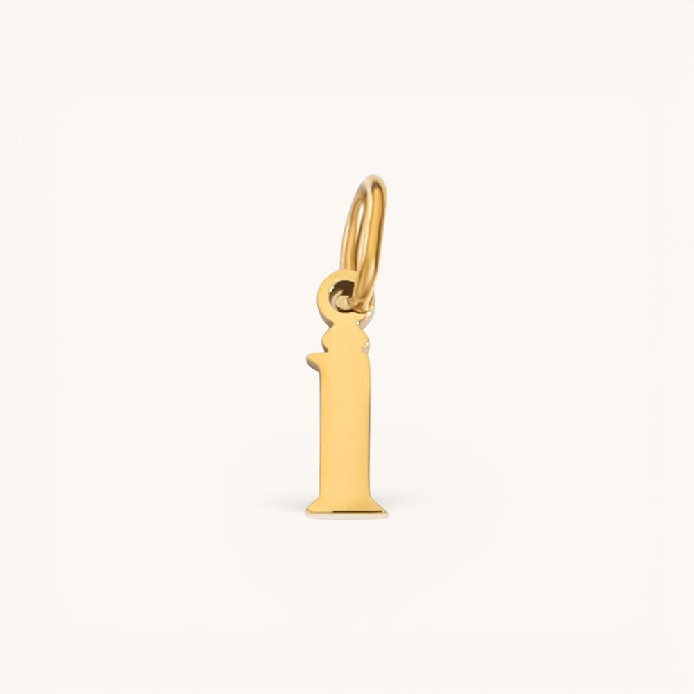 Nadare Co. lower case letter i charm in 14k gold plated stainless steel, side view