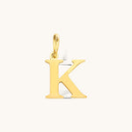 Nadare Co. gold-plated stainless steel letter K charm with a classic serif font for everyday layering.
