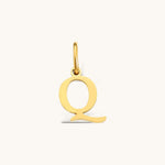 Nadare Co. gold-plated stainless steel initial charm featuring a polished serif letter Q on a small jump ring.