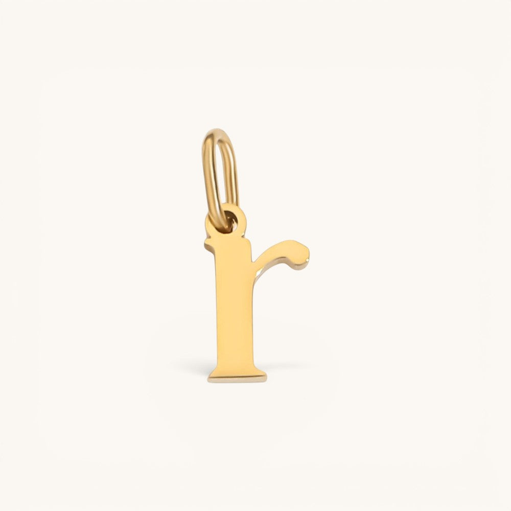 Nadare Co. lower case letter r charm in 14k gold plated stainless steel for everyday layering