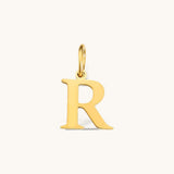 Nadare Co. gold plated stainless steel letter R initial charm with a classic serif font design.
