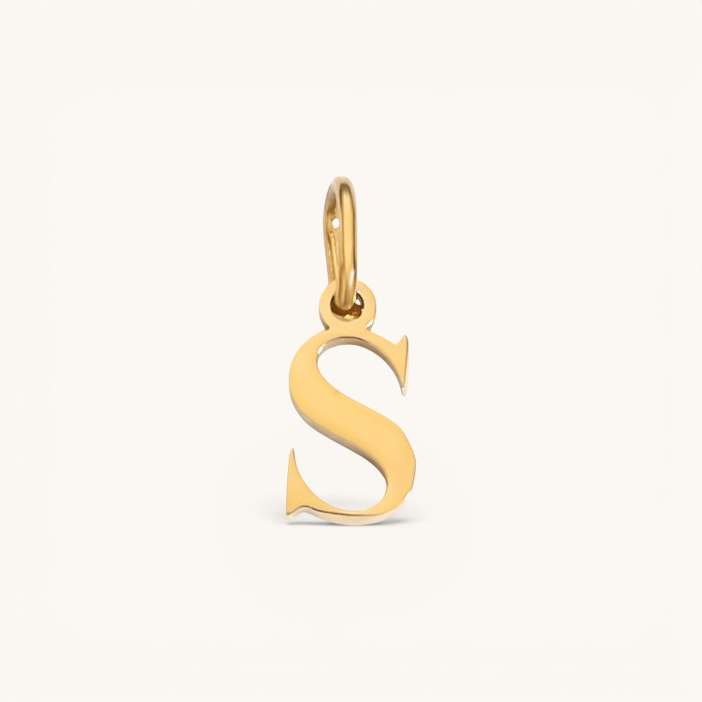 Nadare Co. lower case letter S charm in 14k gold plated stainless steel for everyday layering