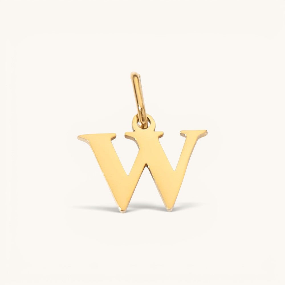 Nadare Co. lowercase letter W charm in 14k gold plated stainless steel for everyday jewelry layering.