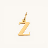 Nadare Co. lowercase letter Z charm in 14k gold-plated stainless steel for everyday jewelry layering.
