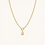 Nadare Co. gold-plated stainless steel lowercase letter a charm pendant on a delicate matching chain
