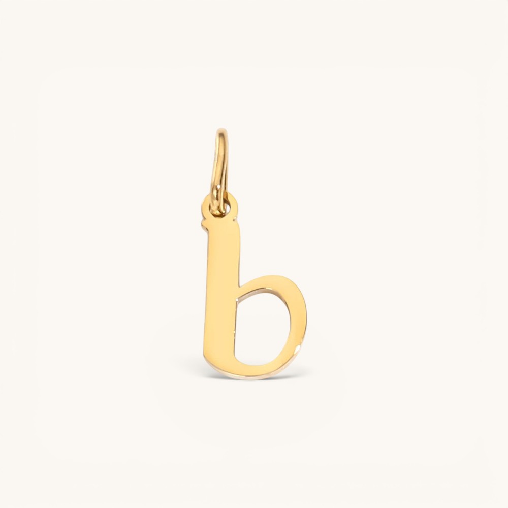 Nadare Co. lowercase letter b charm in 14k gold-plated stainless steel with a polished finish.