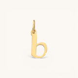 Nadare Co. lowercase letter b charm in 14k gold-plated stainless steel with a polished finish.