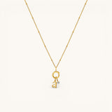 Nadare Co. gold-plated stainless steel lowercase letter a charm necklace with a delicate beaded chain and diamond accent
