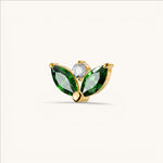 Nadare Co. gold threadless piercing front with two green marquise-cut CZ stones and one round white CZ accent.