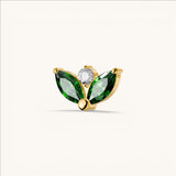 Nadare Co. gold threadless piercing front with two green marquise-cut CZ stones and one round white CZ accent.