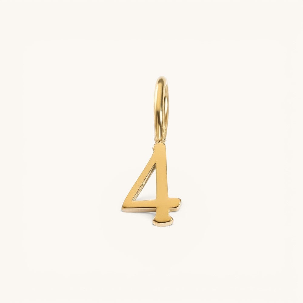 Nadare Co. number four charm in 14k gold plated stainless steel, featuring a minimal design for everyday wear.