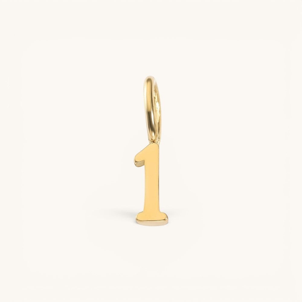 Nadare Co. number one charm in 14k gold plated stainless steel for personalized jewelry layering