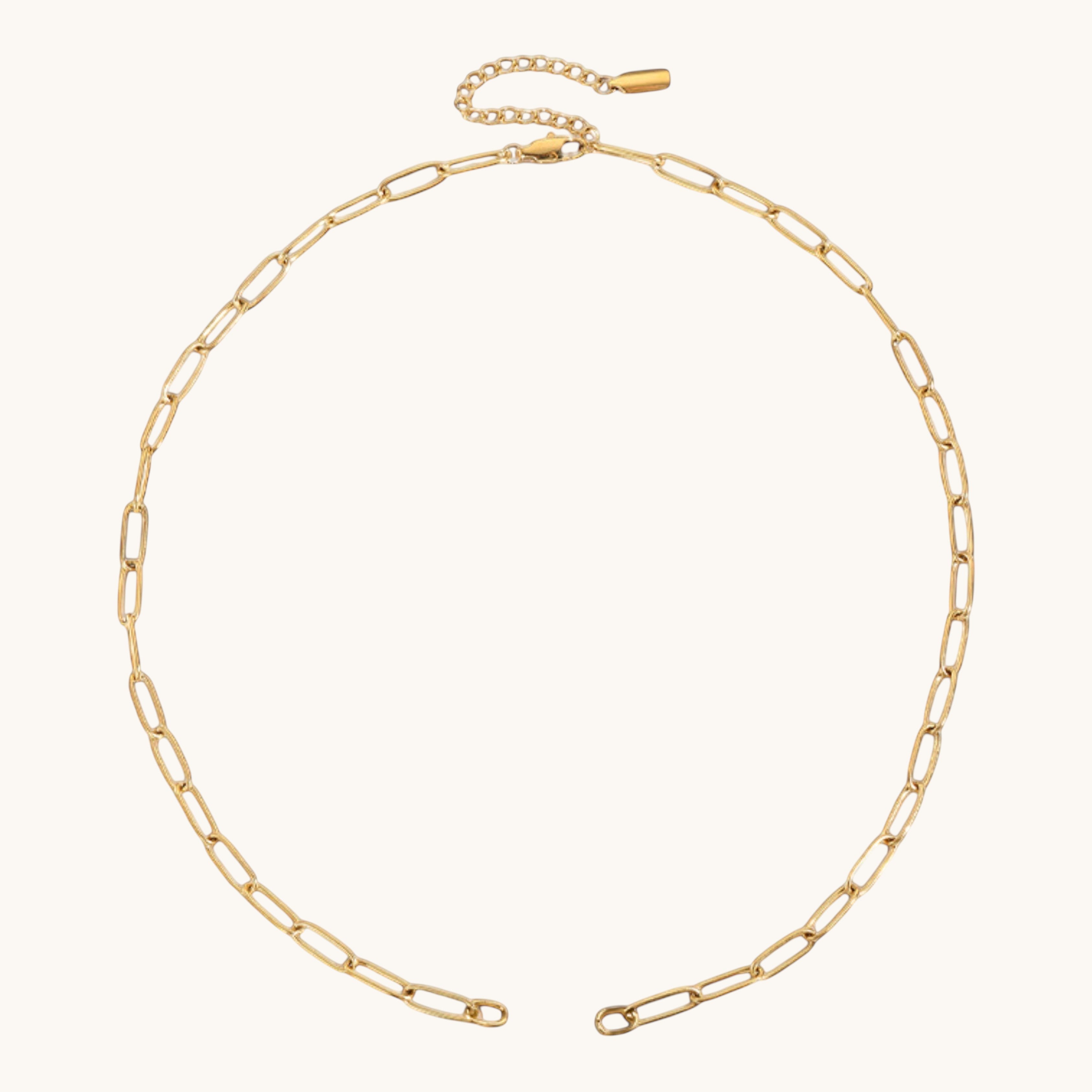 Nadare Co. gold plated large oval switch chain necklace with an adjustable extension and tarnish-resistant finish.